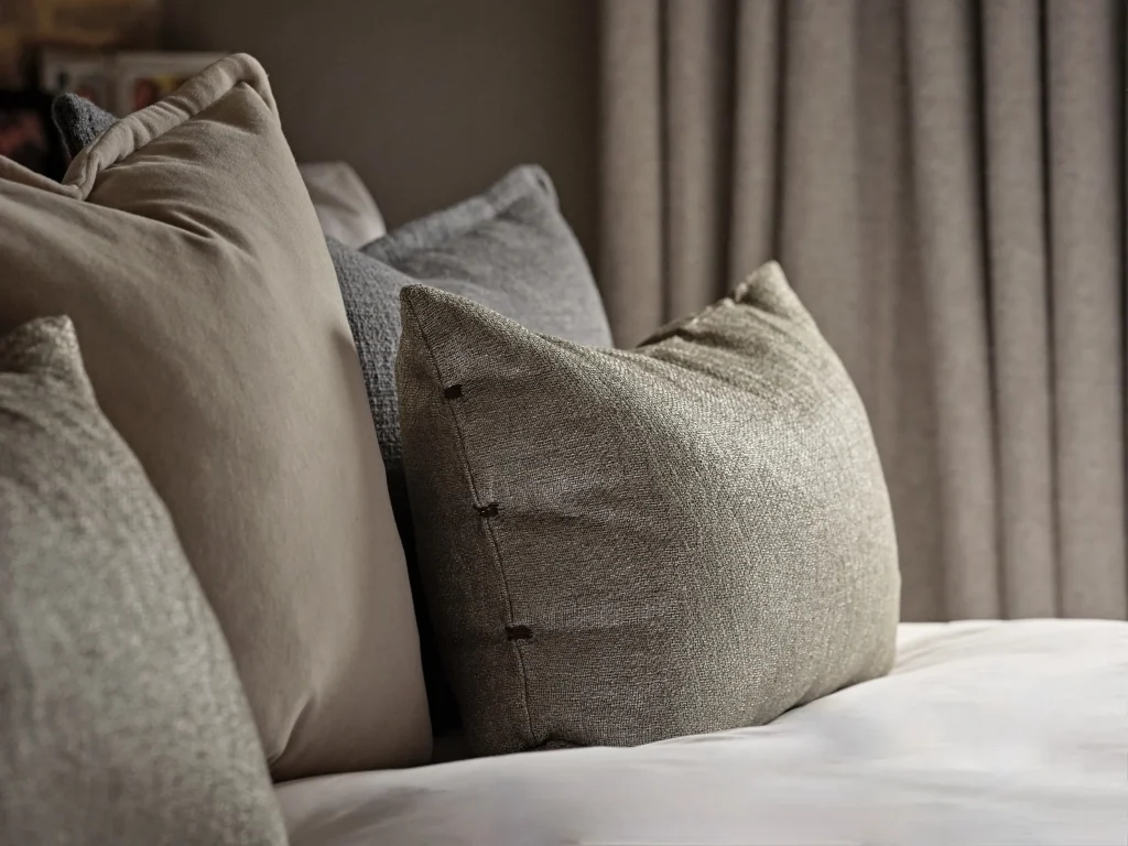 Bespoke decorative cushons in a Cotswolds country house